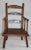 Early 19th century ladder back child's chair from New England in fantastic condition. This early chair is mortised and...