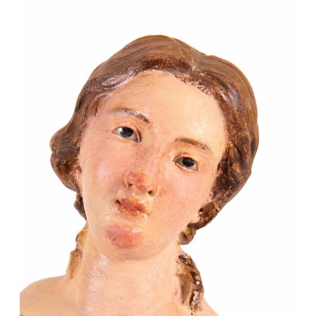 Head of woman man realized in polychrome ceramic with glass eyes. Neaples, 18th Century. Very good condition.