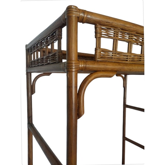 A wonderful vintage wicker and wood very solid huge storage shelving unit cabinet. The cabinet is in the style of Ficks...