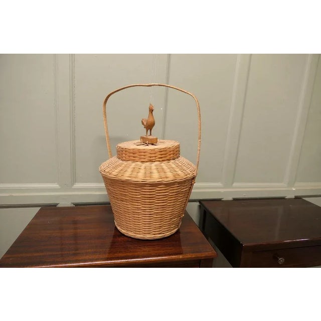 An Oriental Bamboo Chicken Basket or Shopping Basket This is a very attractive basket with a round lid which has a carved...