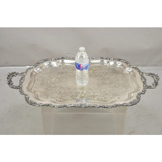 Vintage Community Ascot Sheffield Large Victorian Silver Plated Platter Bar Tray. Item features ornate shell form twin...