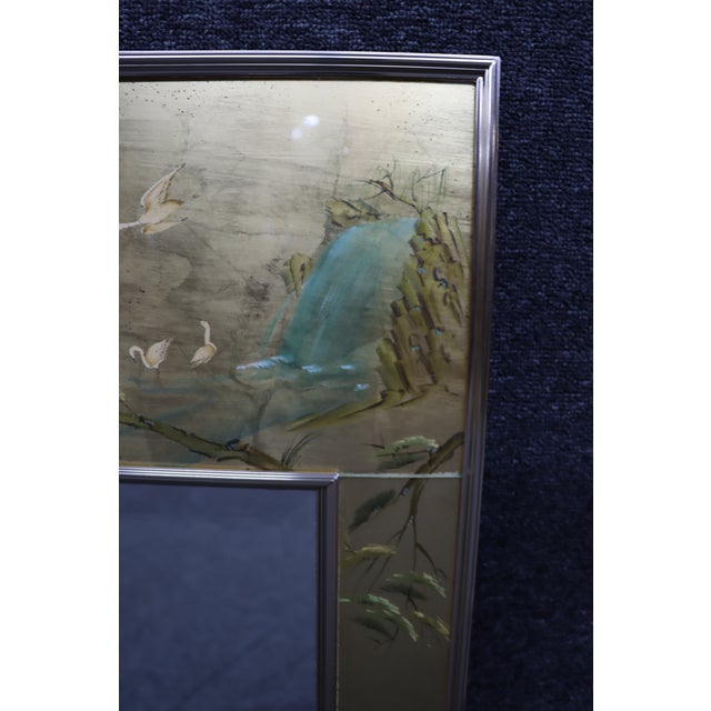 LaBarge wall mirror featuring a hand-decorated Chinoiserie surround with an antiqued gold leaf finish. The frame is...