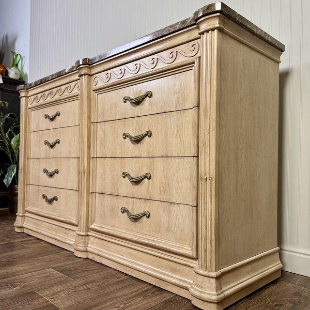 Beautiful vintage dresser by Bernhardt featuring a substantial genuine marble top and an elegant, European-inspired...