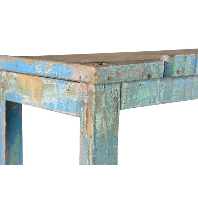 This Vintage Indian Teakwood Shelf or Small Bookcase is constructed from solid teakwood, featuring four open shelves...