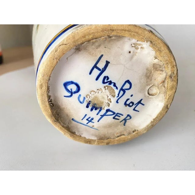 Vase in ceramic from France. It has been done during the 19th Century. Decor with Caracthers and Flowers. Main clors are...