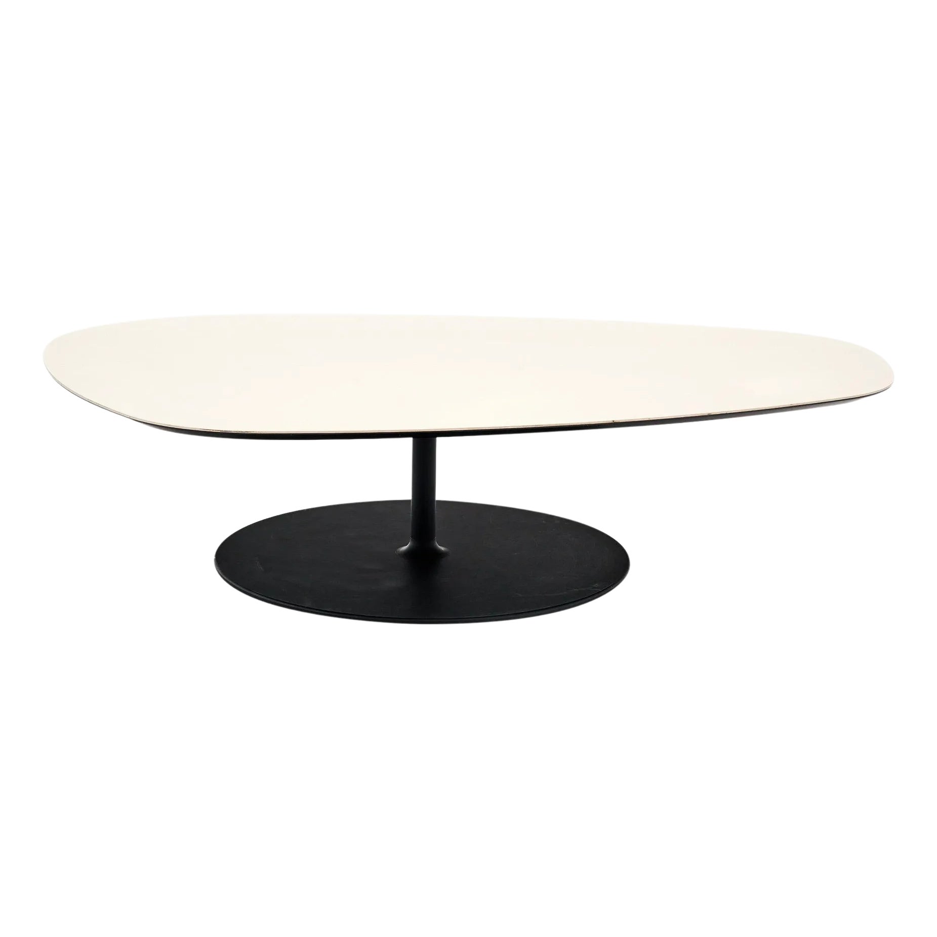 White oval coffee table with a black pedestal base.