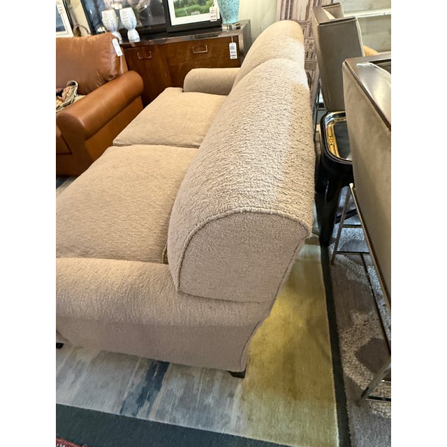 Design Plus Gallery presents a Rolled Arm Sofa on Casters from J. Fitzgerald. The sofa has a soft tan upholstery with...