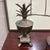 vintage Hollywood Regency style solid brass pineapple urn, often featuring a removable lid with detailed leaf top and...