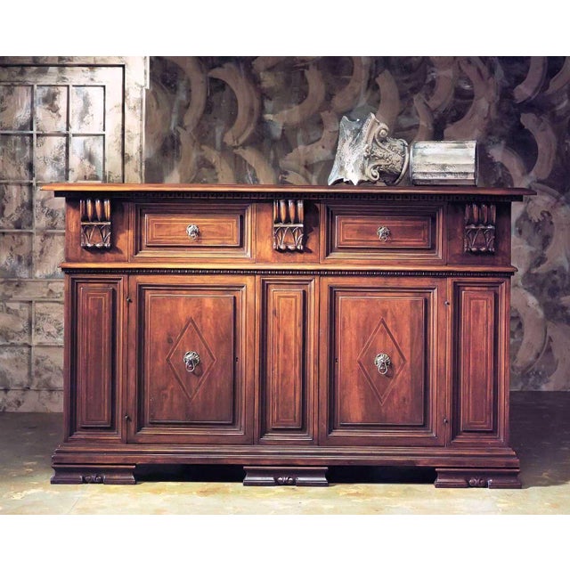 Handcrafted in Italy from solid walnut, this Tuscan sideboard features a warm antique distressed finish, raised panel...