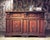 Handcrafted in Italy from solid walnut, this Tuscan sideboard features a warm antique distressed finish, raised panel...