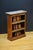 K0630 a low victorian marble topped open bookcase, having original veined marble above a shallow frieze and two height...