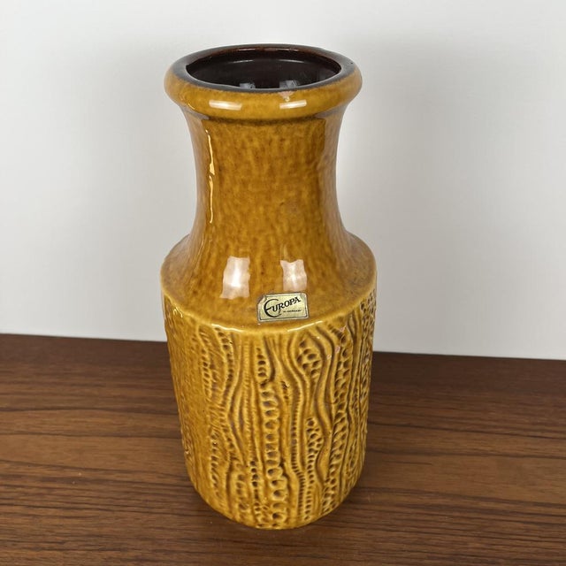 West Germany yellow "reptile" vase, Europa Glazed ceramic Dimensions: Height: 31 cm Diameter: 13.5 cm Vintage item,...