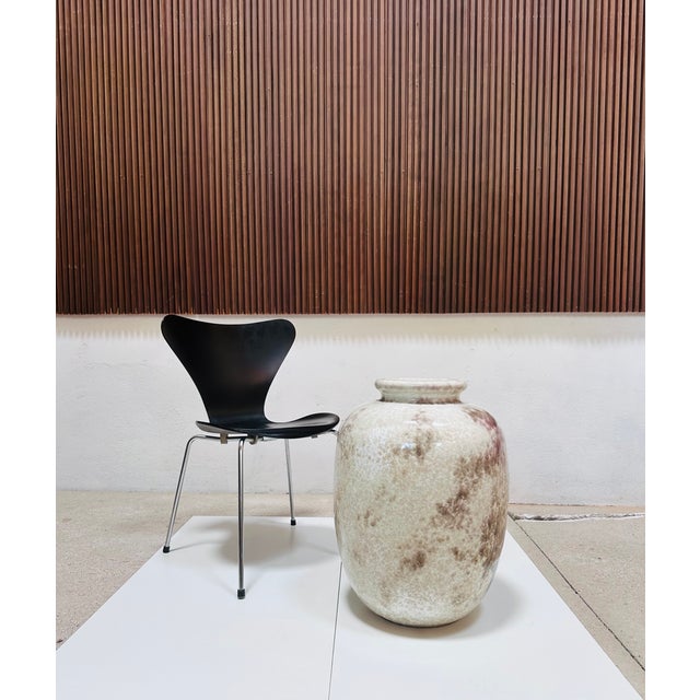 This extraordinary, monumental floor vase by the German ceramic artist Richard Uhlemeyer (1900-1954) is an impressive...