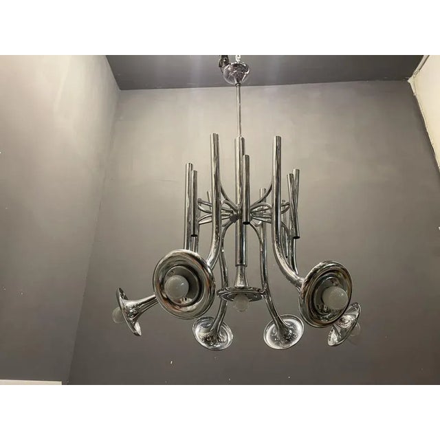 Mid-Century Chrome Chandelier Height including rod and ceiling canopy 98 cm Width 66 cm Features 7 lights Requires E14...