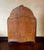 The back is solid wood, While the dimensions listed are for the frame, the mirror dimensions are as follows; Length - 35.5...