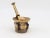 This early 20th-century mortar and pestle is made of brass with an honest patina. Both the mortar and pestle are...
