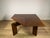 Square walnut folding table, made by Catalano in the 1960s. The table has been carefully cleaned; there are signs of...