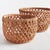 With a unique weave and oval profile, this set of 2 baskets are firm and substantial. Made of durable banana leaves and...