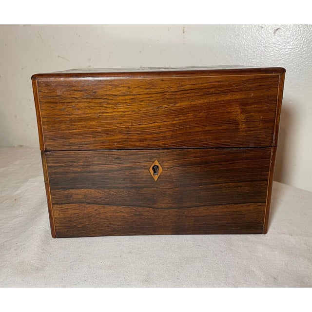 Crafted with meticulous attention to detail, this antique 19th century Dutch Thee/tea caddy is a testament to the artistry...