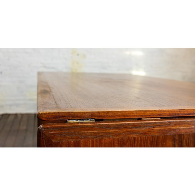 Hans Wegner "Saber-Legged" dining table Model AT-314, with two drop leaves. The leaves (w/pullout supports) are designed...