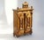 Antique solid oak small cabinet in Gothic style with so many hand carved ornaments all over. It has two doors and in the...