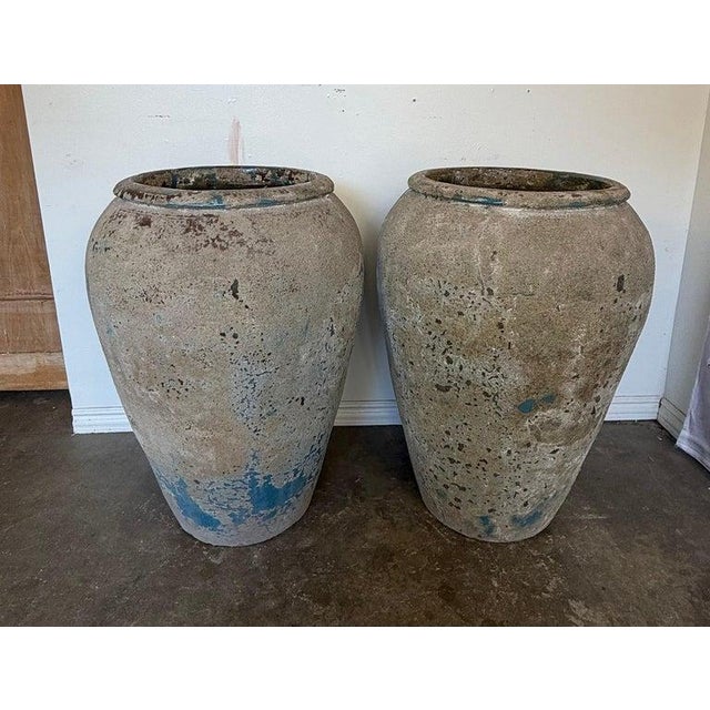 A magnificent and highly atmospheric pair of monumental antique water jars, or pithos, embodying the very essence of Wabi-...