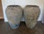 A magnificent and highly atmospheric pair of monumental antique water jars, or pithos, embodying the very essence of Wabi-...