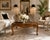 Elegant 1960s French Provincial coffee table crafted in oak with a beautifully aged warm finish. The substantial square...