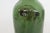 This lovely Empty Bottle is made out of mold-blown glass. This gorgeous bottle presents a rich olive green color to the...