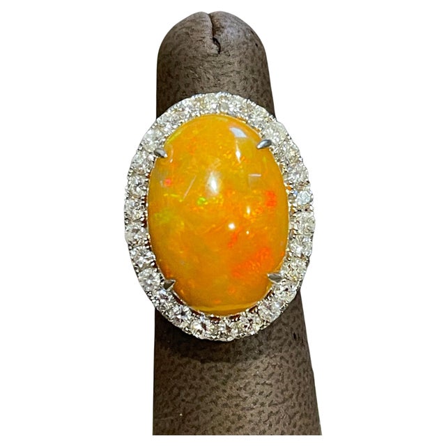 Oval Opal and Diamond Cocktail Ring 18 Karat White Gold, Estate Size 7 18 Karat White Gold Estate Size of the stone 25MM X...