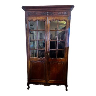 Antique Tall Ornate Carved Walnut Double Door Paned Glass With Four Shelves For Sale