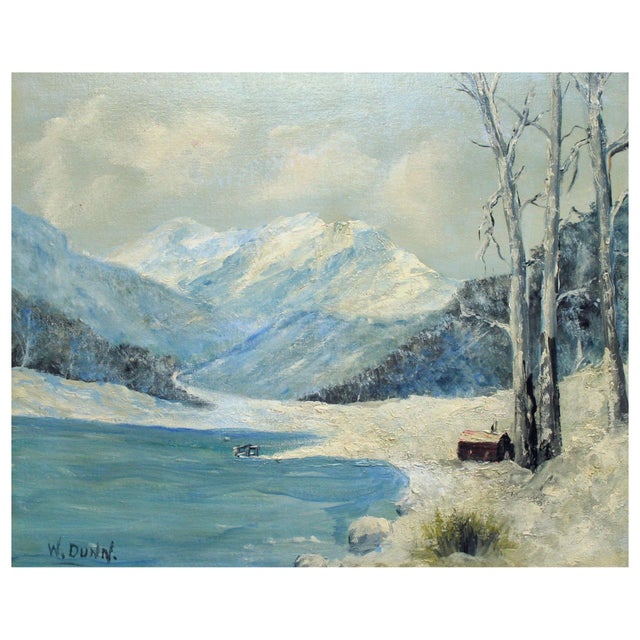 Serene mid-century winter landscape with a cabin near a lake covered in snow and tall mountains in the distance by William...
