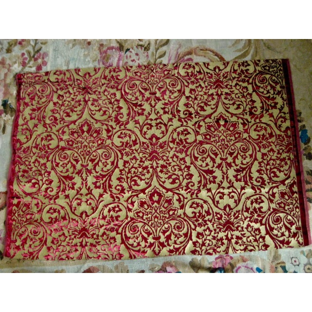 This is a large coupon never used of hand printed metallic gold on silk burgundy velvet from the prestigious textile maker...