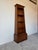 Elegant vintage bookshelf by Drexel, dating to the 1980s, crafted from solid wood with a warm, rich finish and beautifully...