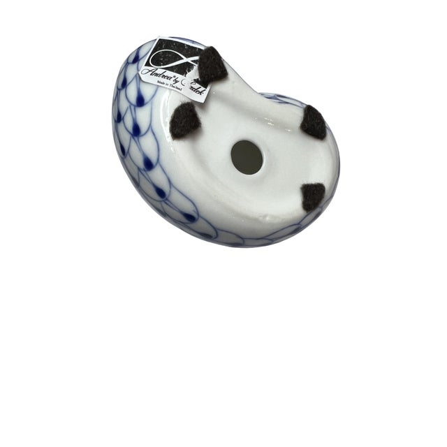 Andrea by Sadek hand painted blue fishnet pattern on a white ceramic shell 3 1/2” x 2 1/2”
