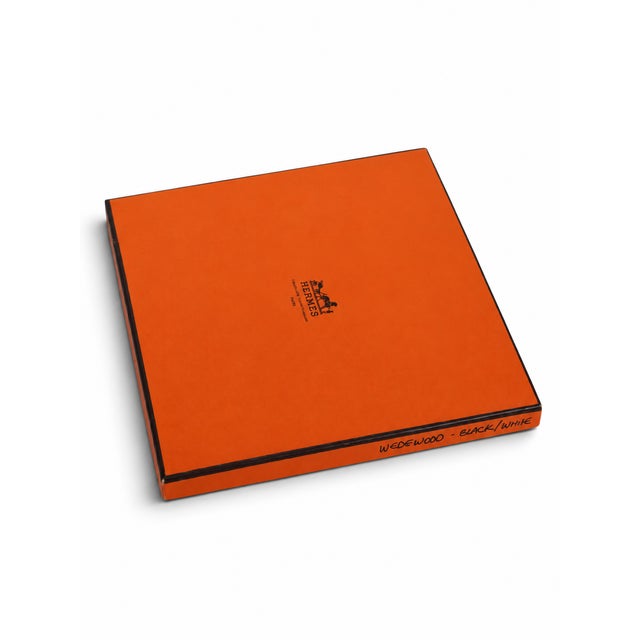 This is a Hermes Paris Wedgwood silk scarf with the original box designed by Phillippe Ledoux in 1974. The scarf is in...