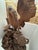 Monumental hand-carved solid wood sculpture depicting an elaborate marshland wildlife scene featuring a large wading bird...