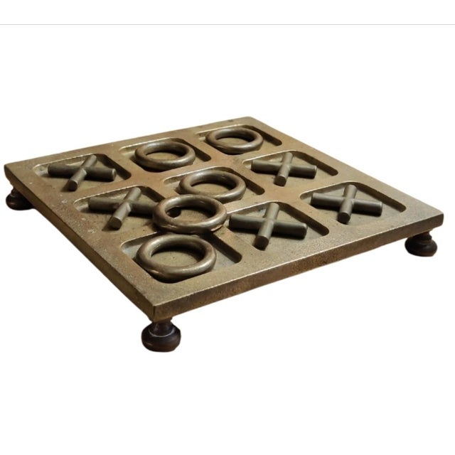 For your consideration . . . A rare vintage brass Tic Tac Toe Board Game. This iconic board game is from Sarreid Ltd. The...