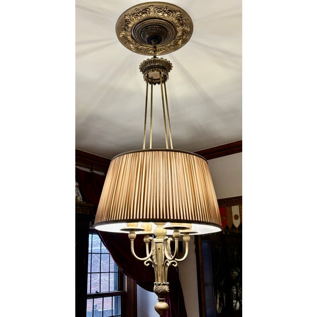 A very rare and exceptionally monumental Maitland-Smith four-light chandelier, standing an impressive 58 inches tall and...