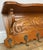 A beautifully crafted vintage French wall-mounted coat hanger, showcasing elegant carved detailing and a rich, warm oak...