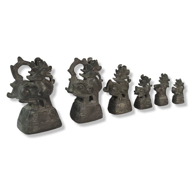 This is an antique set of Burmese opium weights. This group of weights are in the form of auspicious hintha birds. Used in...