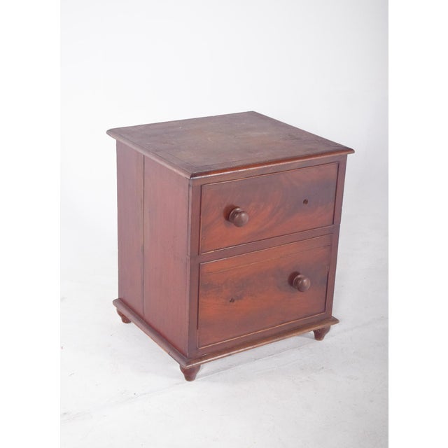 Antique chest with a design that simulates a small chest of drawers, this piece of furniture has a sturdy structure and a...