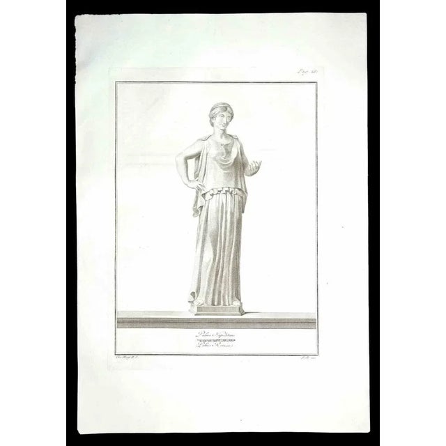Ancient Roman Statue, from the series "Antiquities of Herculaneum", is an original etching on paper realized by Carlo...
