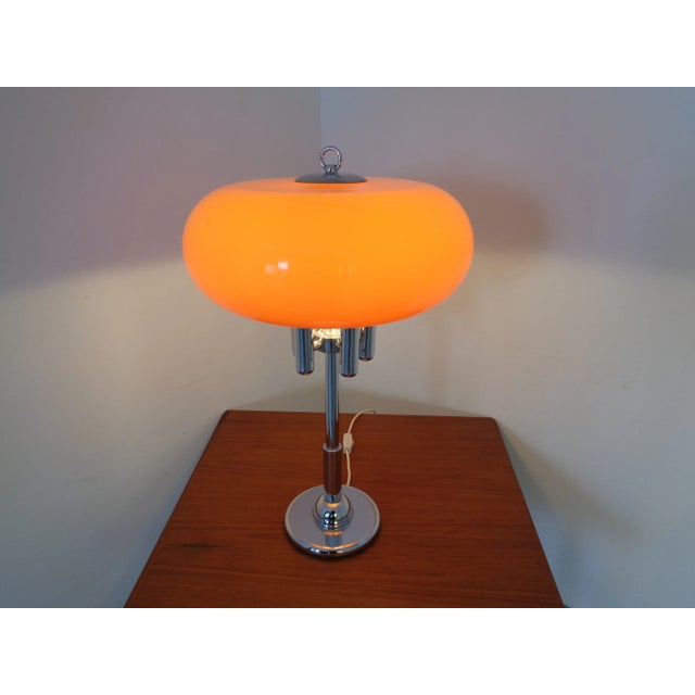 Italian table lamp with chrome stand and orange plastic shade from the 1960s. European Plug (up to 250V).The wiring of...
