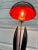 This is a unique vintage black and red lacquered clam wood lamp. In greater working condition. Matched with this custom...