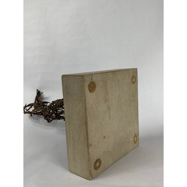 Bronze metal stick atract figure by Clyde Ball. Made in the late 20th century.