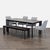 This Living Spaces dining set includes a sturdy rectangular table, four comfortable grey upholstered chairs, and a...