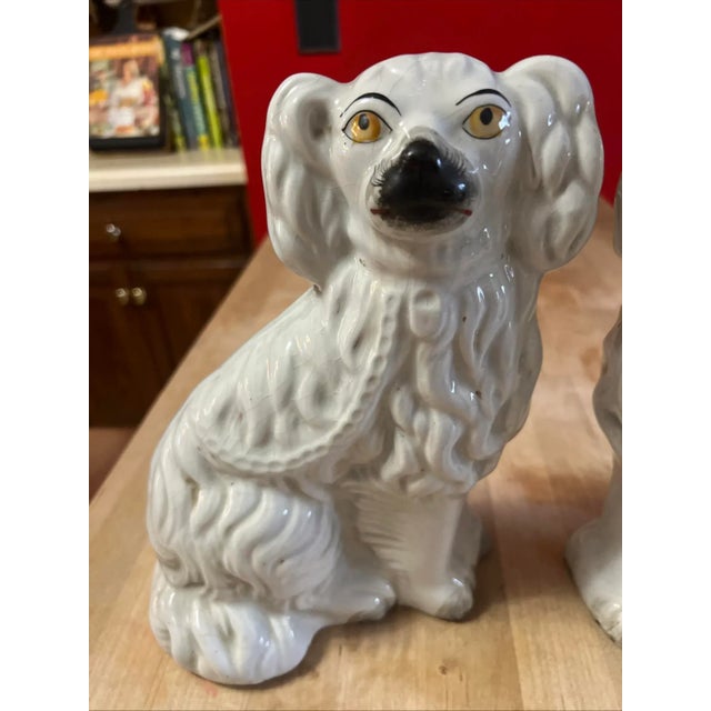 A Fine Pair of Antique Decorated Staffordshire dogs, circa 1860's Made in the Staffordshire district of Stoke on Trent,...