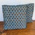 Pair of small handmade square pillows in a blue cotton print with brown and gold sunflowers. Each pillow has a flanged...