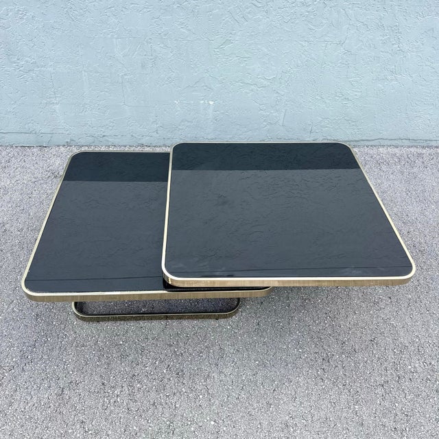 Mid 20th Century Art Deco Gold and Black Glass Swivel Top Two Tier Coffee Table For Sale - Image 5 of 12